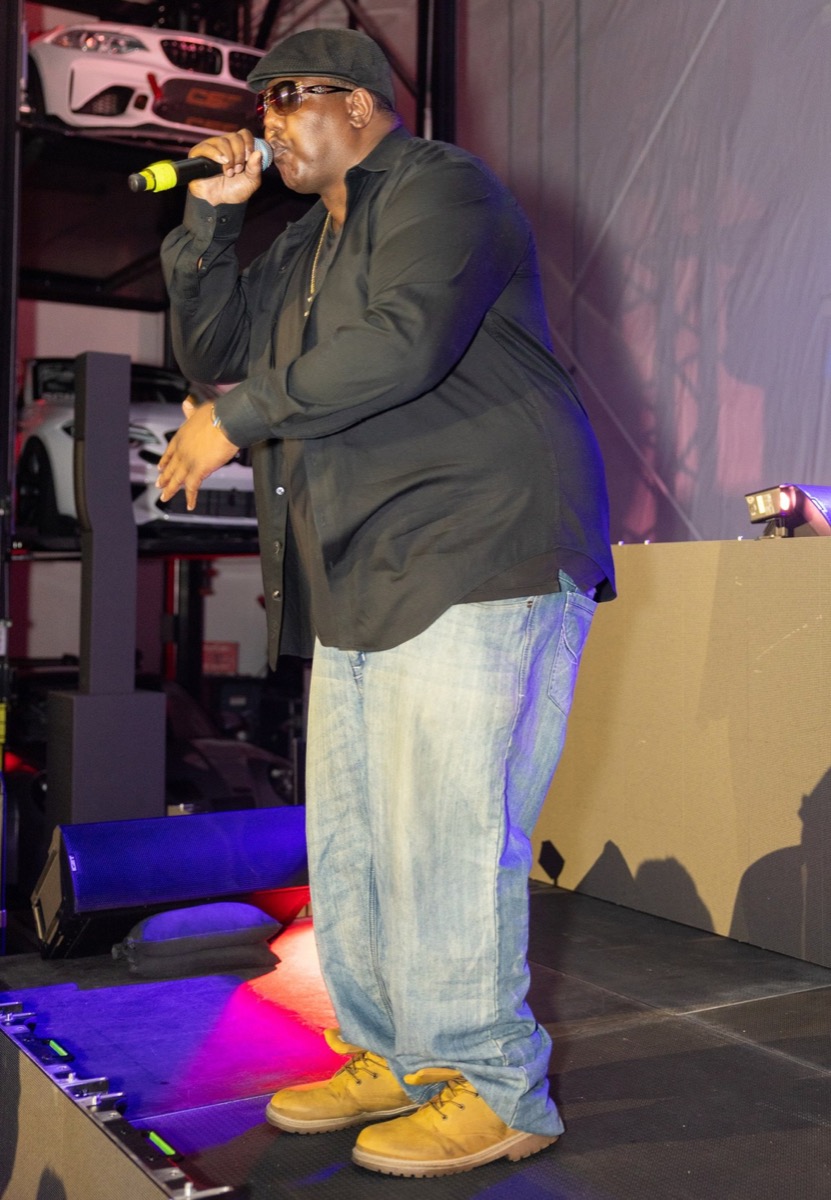Edward Williams III as Biggie performing live