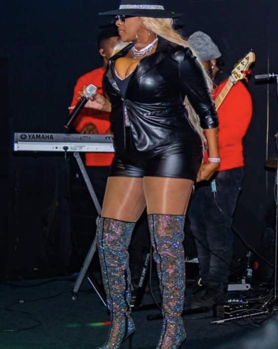 Full-length view of Tre’Jae performing onstage