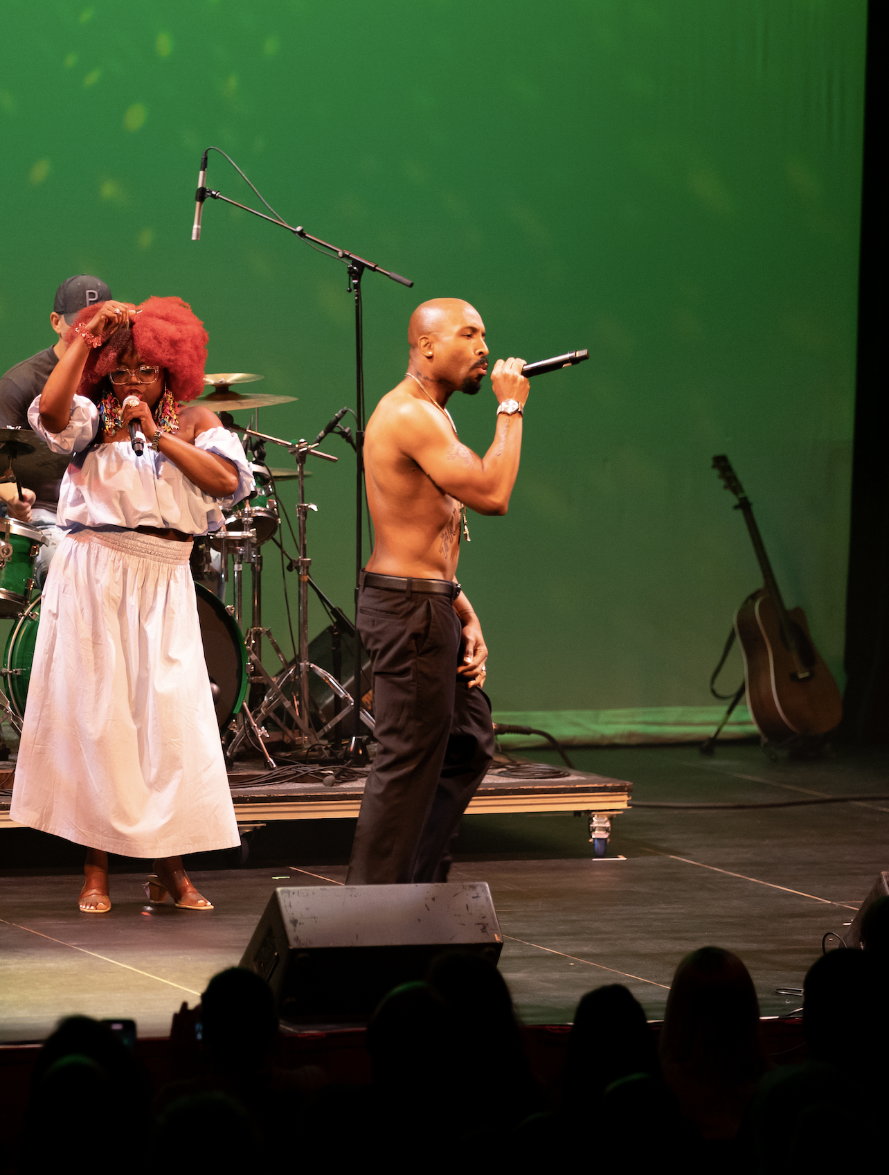 Josh Harraway as Tupac performing onstage